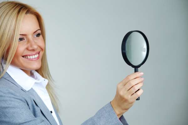 Beauty Advisor looking at customer skin profile